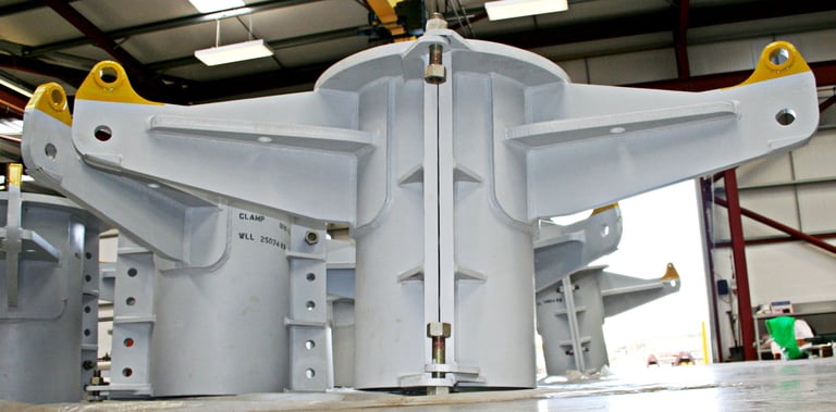Riser Securing Clamps