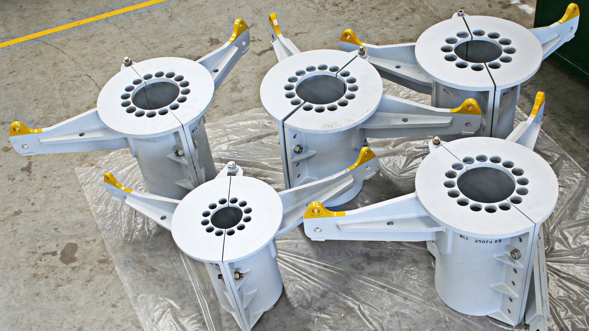 Riser Securing Clamps on Workshop floor