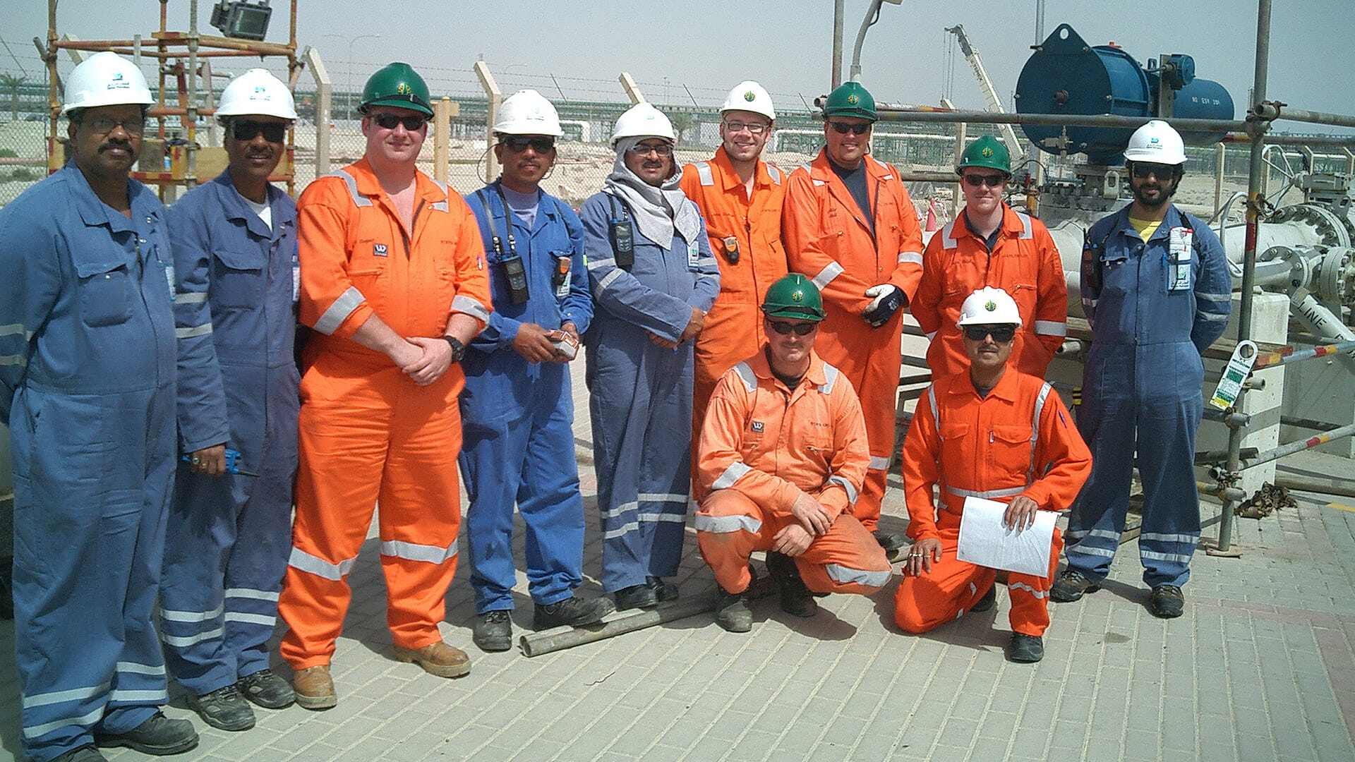 STATS Group and QP team lined up together for a team photo