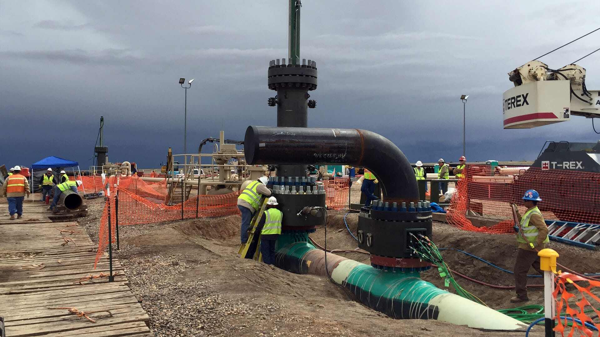 People working on a 24” bypass line installation