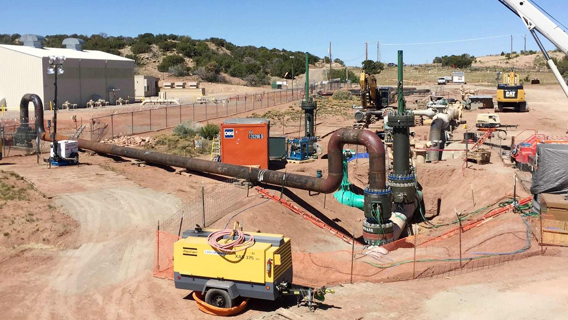 30in BISEP cw bypass site view showing diggers and pipeline