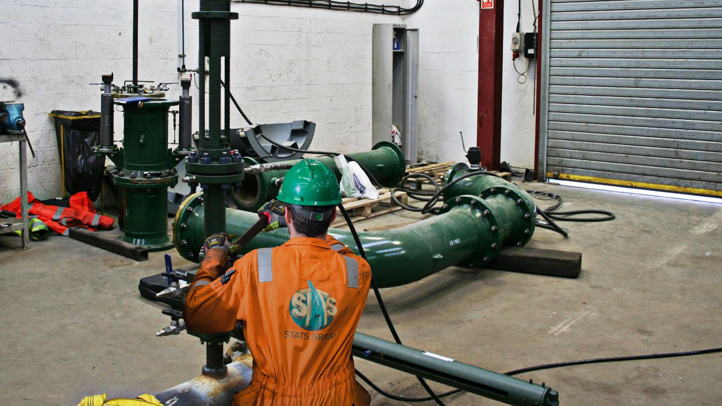 STATS team member working on a BI-Stop tool in the workshop